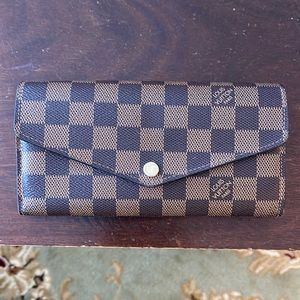Authentic Louis Vuitton Sarah wallet! Great condition.
